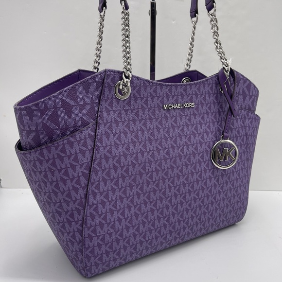 Michael Kors Handbags - MICHAEL KORS 
Jet Set Travel Lg Signature Chain Shoulder Tote Bag
Dark Purple